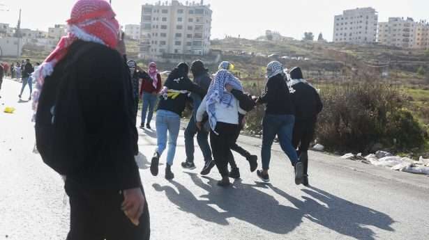 Palestijnen keerden op 11 januari terug naar huis na een botsing met Israëlische soldaten in de buurt van Ramallah.